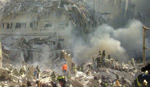 In this Sept. 11, 2001 file photo, a shell of what was once part of the facade of one of the twin towers of New York’s World Trade Center rises above the rubble that remains after both towers