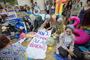 Protesters constructed a temporary 'beach' outside the French Embassy in London last month to vent their anger at the controversial burkini ban across the channel