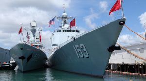 Chinese Peoples Liberation Army Naval Frigate Hengshui (L) is moored next to the PLAN ship Xi'an