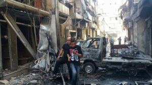 Residents in Midan, a Christian district of Aleppo, hit by mortar shelling