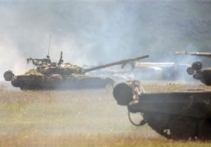 Russian T-80 tanks take part in a tactical military exercise in Armenia