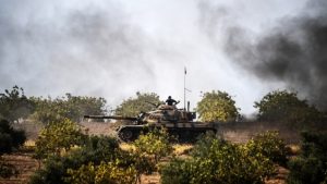 Turkish Army tanks driving to the Syrian Turkish border town of Jarabulus, August 25, 2016
